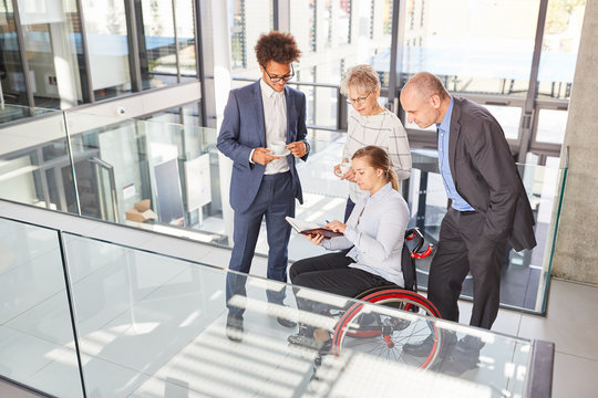 Businesswoman in a wheelchair makes appointment planning