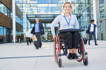 Businesswoman and congress participant in a wheelchair