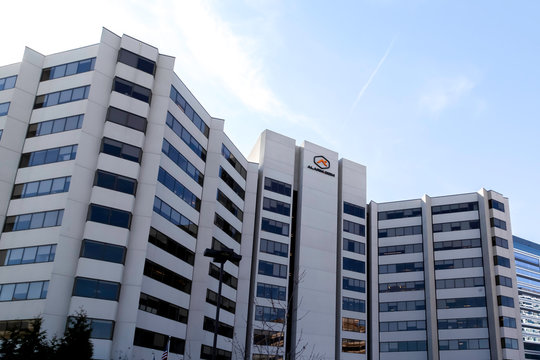 Tysons Corner, Virginia, USA- March 1, 2020: Alarm.com headquarters building in Tysons Corner, Virginia, USA. Alarm.com, Inc is an American technology company that provides cloud based services. 