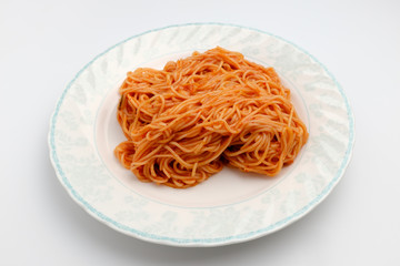 Seasoned noodles served on a plate