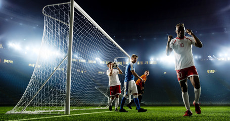 Tense game moment in front of the goal on the empty professional soccer stadium. No spectators on tribunes. Stadium is made in 3d.