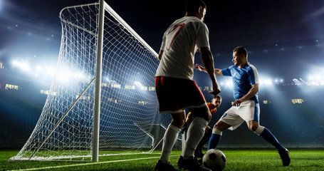 Tense game moment in front of the goal on the empty professional soccer stadium. No spectators on tribunes. Stadium is made in 3d. © haizon