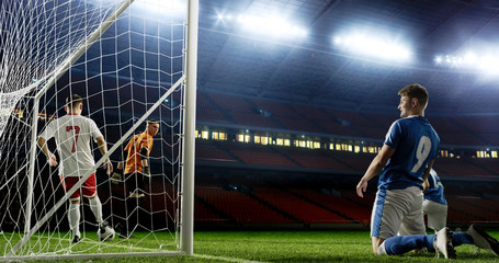 Tense game moment in front of the goal on the empty professional soccer stadium. No spectators on...