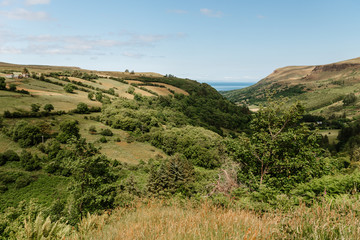 Wide summer landscape, Waterfall Trail, Glenariff Forest Park, Antrim, Northern Ireland
