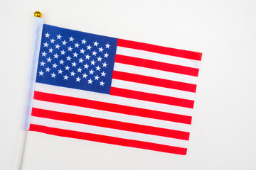Flag of the United States of America on a white background. American flag. Official symbol of the United States. Red and white striped banner with stars on a blue background. The star-spangled banner.