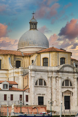 Fototapeta premium An old and weathered stone church in Venice, Italy