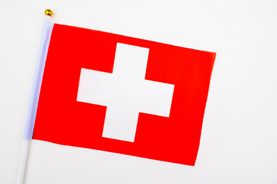 Swiss flag on a white background. Red banner with a white cross. Official symbol of Switzerland. Swiss flag. Flags of the world.
