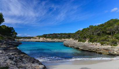 Turquoise waters of a bay in the Mondrago Natural Park, Mallorca, Spain