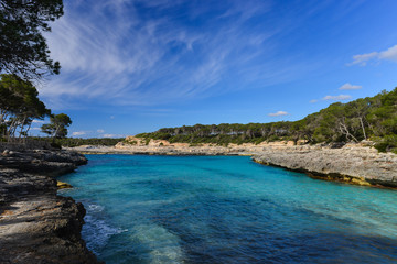 Turquoise waters of a bay in the Mondrago Natural Park, Mallorca, Spain