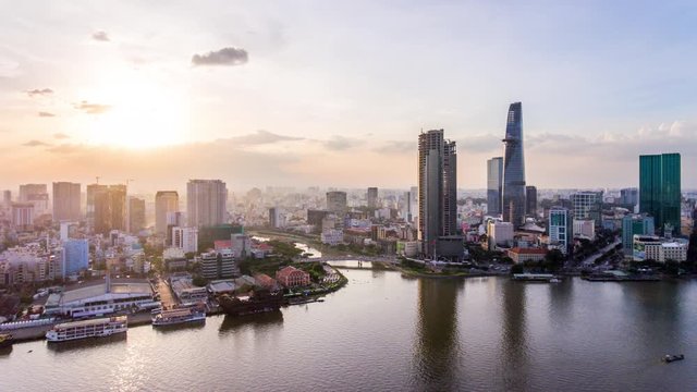 Timelapse of District 1, the central urban district of Ho Chi Minh City (Saigon), the largest city in Vietnam. Featuring famous landmarks and skyscrapers along Saigon river