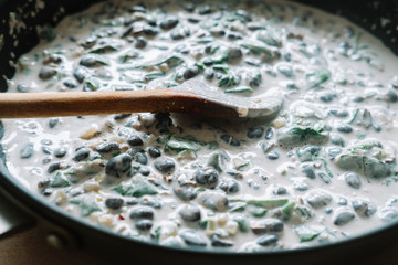 Homemade dish of spinach, black beans and cream. Healthy Nutrition meal. Sofia, Bulgaria.