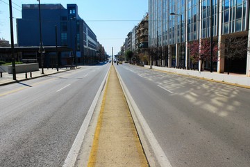 Fototapeta na wymiar Athens, Greece, March 21 2020 - Empty Suggrou Avenue, one of the most crowded streets of Athens due to Coronavirus outbreak. 