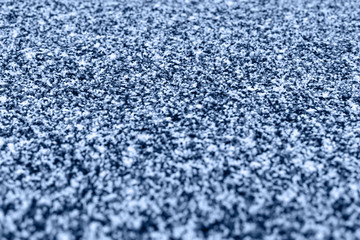 Galaxy Blue carpet pile, texture. Focus with shallow depth of field.