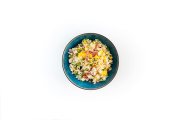 Homemade Chinese fried rice with vegetables and fried eggs
