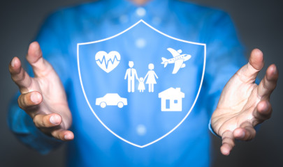 Businessman with protective gesture and family, life, car, travel, health and house insurance icons. Insurance concept.
