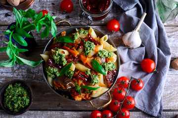 Pasta with Grilled Eggplant, Smoky Tomato Sauce and Basil Walnut Pistou .style rustic.selective focus