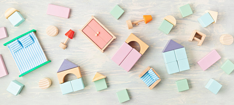 Flat Lay With Wooden  Blocks In Pastel Colors. Eco Friendly, Zero Waste, Plastic Free, Educational, Gender Neutral Toys For Children