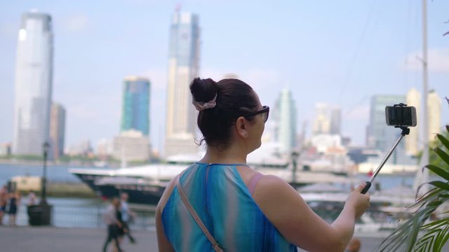 Girl Taking Selfie on Manhattan in New York City in 4K Slow motion 60fps
