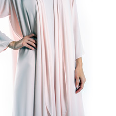 Arabic Muslim woman in a stylish abaya, in white background - Image
