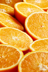 Heap of fresh halved orange slices