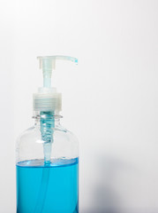 soft focus of clean hand alcohol gel sanitizer pump in home for hygiene protect weak ill chemotherapy, aids, kids patient from flu, germ, virus infection and bacteria .