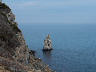Solitary rock in the sea