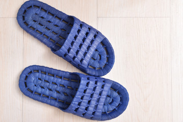 Blue rubber shoes for wearing in the operating room