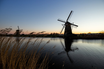 Windmills kinderdijk netherland during sunset