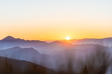 Sunrise over mist valley