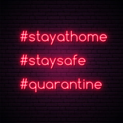Stay at home, Stay safe, Quarantine quote for protection from coronavirus. Hashtag Quarantine neon sign. Coronavirus night neon signboard. Vector design for social media and network.