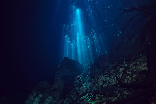 underwater landscape mexico, cenotes diving rays of light under water, cave diving background