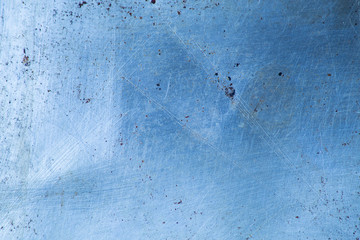 surface of a worn-out metal baking tray, for gastronomical photography background, in cold, blue tones