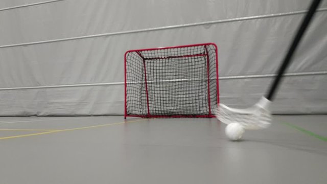 Floor ball stick and ball, Nordic indoor hockey played on court