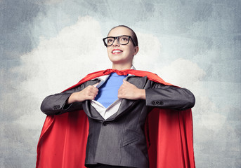 Happy business woman super heroine