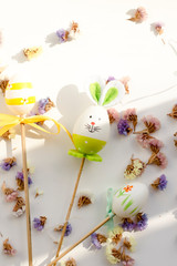  Easter bunny and eggs on a white background with flowers