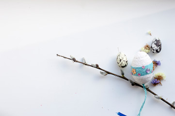  White background for Easter side with egg and twigs of vine