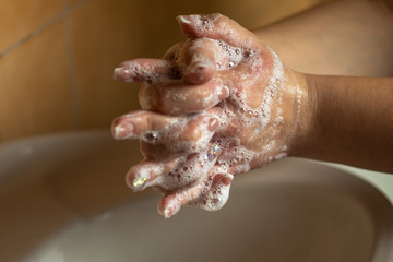 Prevention of influenza - Cleaning hands with soap against disease infection versus flu or...