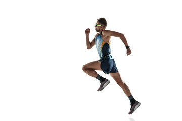 Fototapeta na wymiar Triathlon male athlete running isolated on white studio background. Caucasian fit jogger, triathlete training wearing sports equipment. Concept of healthy lifestyle, sport, action, motion. In jump.