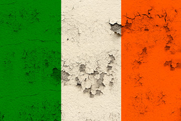 national flag of the modern state of Ireland on an old historical wall with cracks, concept of tourism, travel, emigration, global business