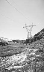 mountain landscape with lattice tower black and white