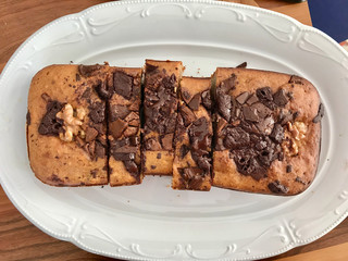 Homemade Organic Healthy Banana Bread Cake Slices with Chocolate Pieces and Walnut.