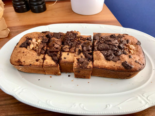 Homemade Organic Healthy Banana Bread Cake Slices with Chocolate Pieces and Walnut.