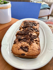 Homemade Organic Healthy Banana Bread Cake Slices with Chocolate Pieces and Walnut.
