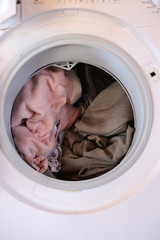 Dirty clothes in wash machine