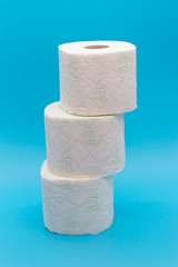 Three rolls of toilet paper, the concept of scarcity and panic buying of toilet paper