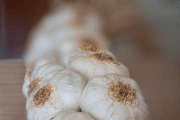 Close-up of a string of garlic.Excellent and obligatory complement to stew, stir-fry, cook, cook and make other succulent culinary dishes