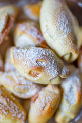 homemade sweet cakes filled with jam from rolled out yeast dough