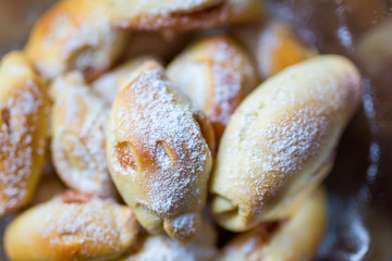 homemade sweet cakes filled with jam from rolled out yeast dough