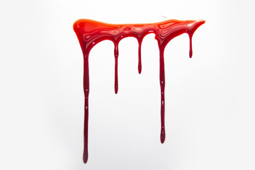 A blood spatter. A blood flowing down. Bloody pattern. Concepts of blood can be used in design