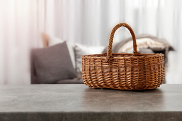 Table background of free space and blurred interior with window. 